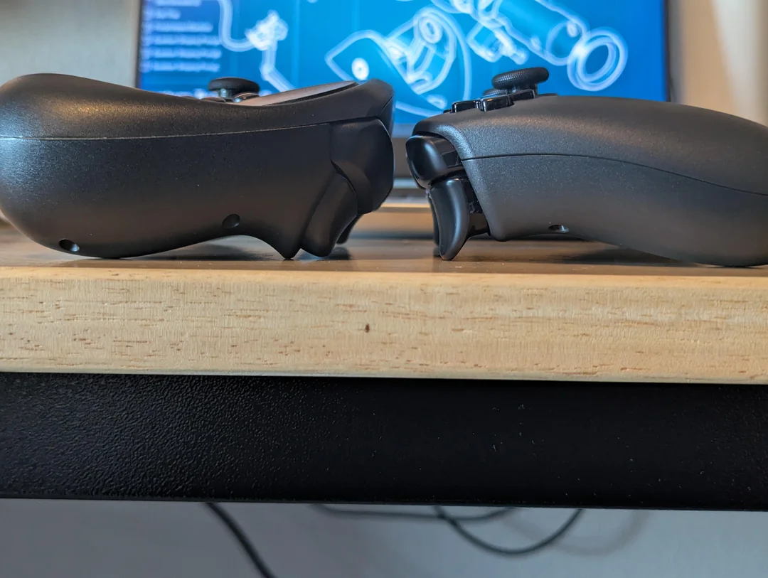 my preorder steam controller next to my day one steam v0 mzb22pmtl00h1